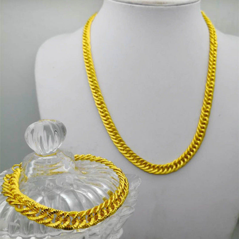 Vergoldetes Schmuckset aus Sand, bestehend aus Halskette, Armband und Ring